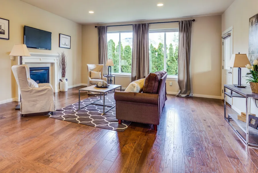 Hand-scraped hickory floor in a lamp-lit living room